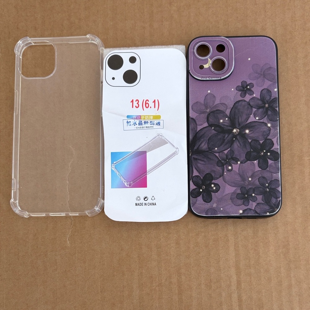 Two IPhone 13 cases - clear elegance and a Purple Floral Phone Case to switch up